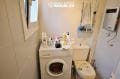 immobilier espagne bord de mer: appartement ref.3335, coin lave linge et toilettes dans la salle d'eau