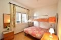 immo roses espagne: appartement 34 m², chambre double avec lit simple superposé