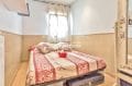 rosas immo: villa 72 m², deuxième chambre avec lit double et rangements