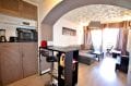 agence immobiliere costa brava: studio 30 m², cuisine ouverte sur salon / séjour lumineux