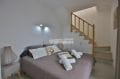 vente immobiliere costa brava: villa94 m², chambre 5 avec lit double et escaliers