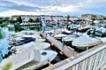 vente immobiliere espagne costa brava: appartement 40 m² avec amarre, vue du salon sur la marina