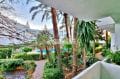vente appartement rosas, 2 chambres 51 m², une terrasse vue jardin et piscine et parking en commun, plage à 1500 m